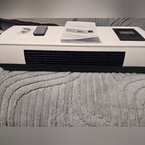 Wall Mounted Sleek White and Black Home Heater & Cold Wind Cooler.